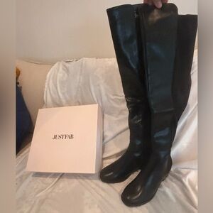 Size 8.5 over the knee flat riding boots. New in box
